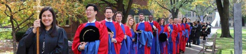 Image depicts students in the faculty of theology dressed in convocation regalia