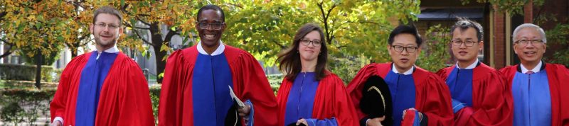 Image depicts students in the faculty of theology dressed in convocation regalia
