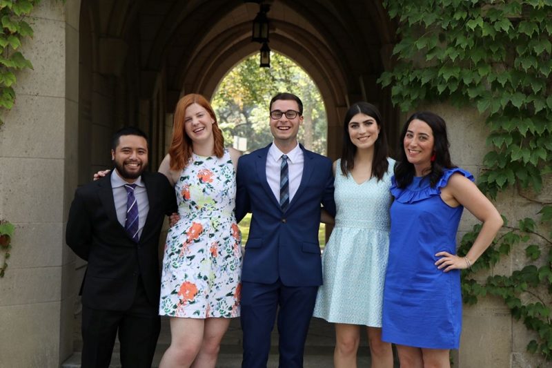Image depicts the incoming commuter dons with the Director of Campus Life Oriana Bertucci