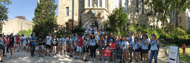 Image depicts students standing on Elmsley place in Orientation groups doing cheers