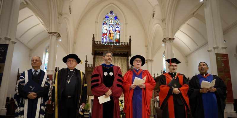 Image depicts David Sylvester being installed as President of the University of St.Michael's College