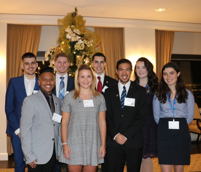 St. Michael's student representatives pose for a photo at the reception.