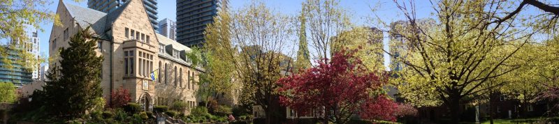 Image depicts Brennan Hall and the Quad in the fall