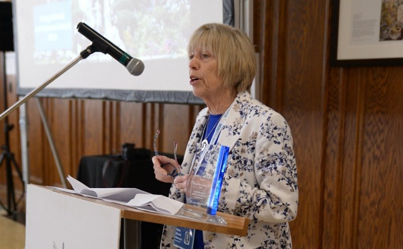 Image depicts Mimi Marrocco receiving the Alway award