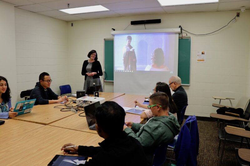 Dr. Callie Callon teaching a graduate class