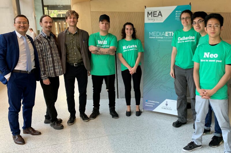 Dr. Paolo Granata poses with student volunteers during the 2019 Media Ecology Association conference at St. Michael's.