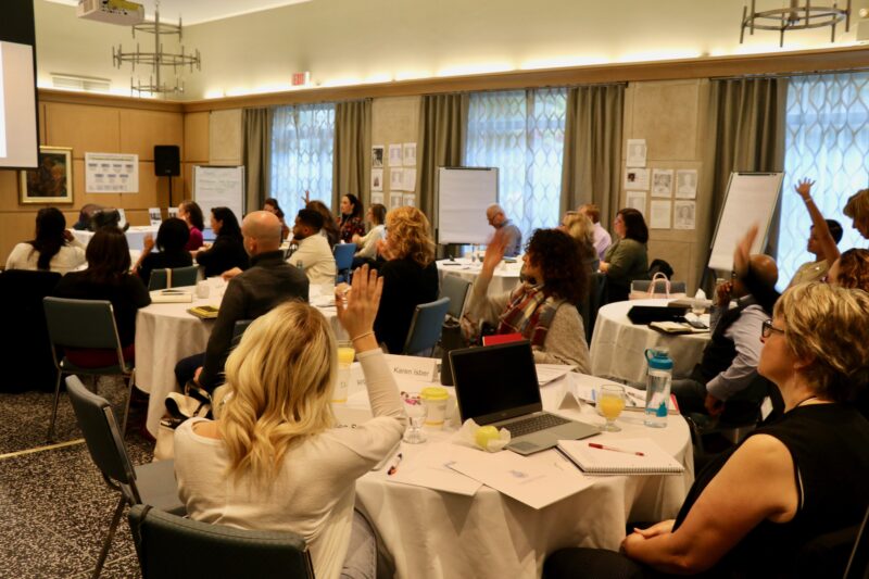 A CSR cohort gathers in Charbonnel Lounge on the St. Michael's campus for an on-site session. 