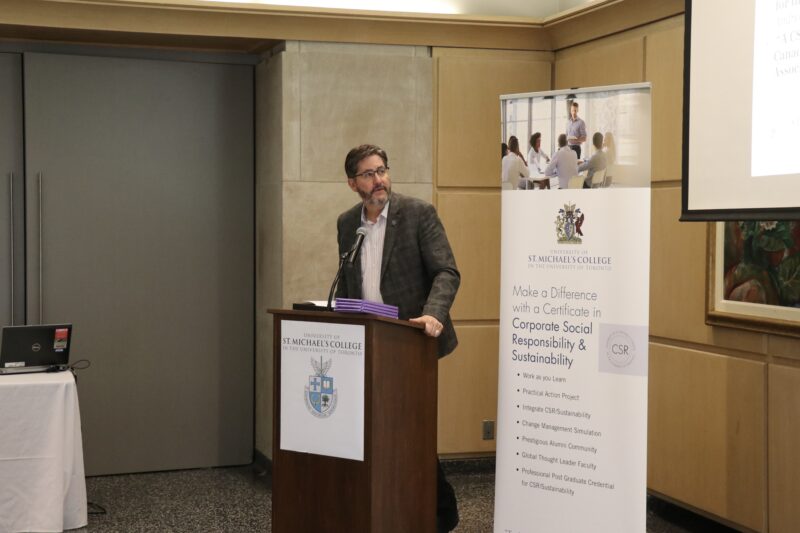 St. Michael's President David Sylvester speaks at a CSR event.