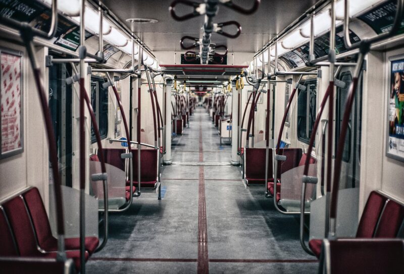Image depicts the inside of an empty subway car in Toronto