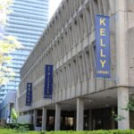 Image depicts the Kelly Library exterior in the spring time