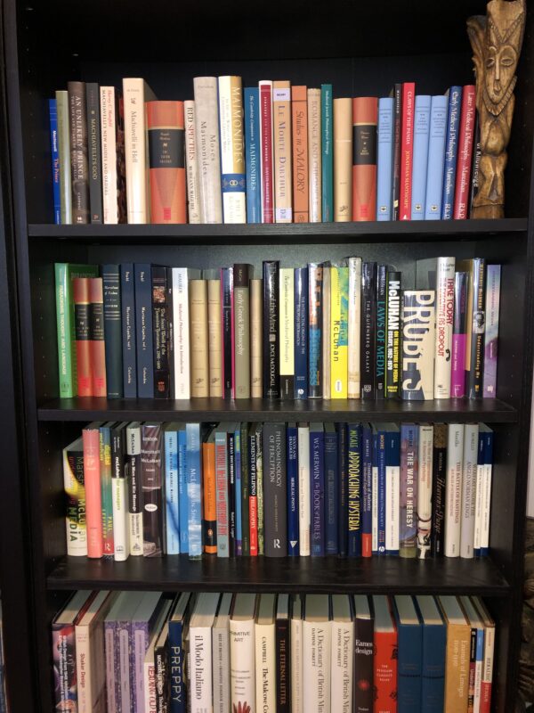 Image depicts staff member Matt Doyle's home bookshelf