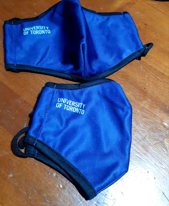 A pair of reusable University of Toronto non-medical masks 