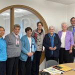 Dr. Koster (centre) and Dr. Syvester (far right) with the Sisters of St. Joseph Leadership Team members Sister Nida Fe Chavez, Sister Georgette Gregory, Sister Anne Purcell, Sister Anne Marie Marrin, and Sister Mary Anne McCarthy.