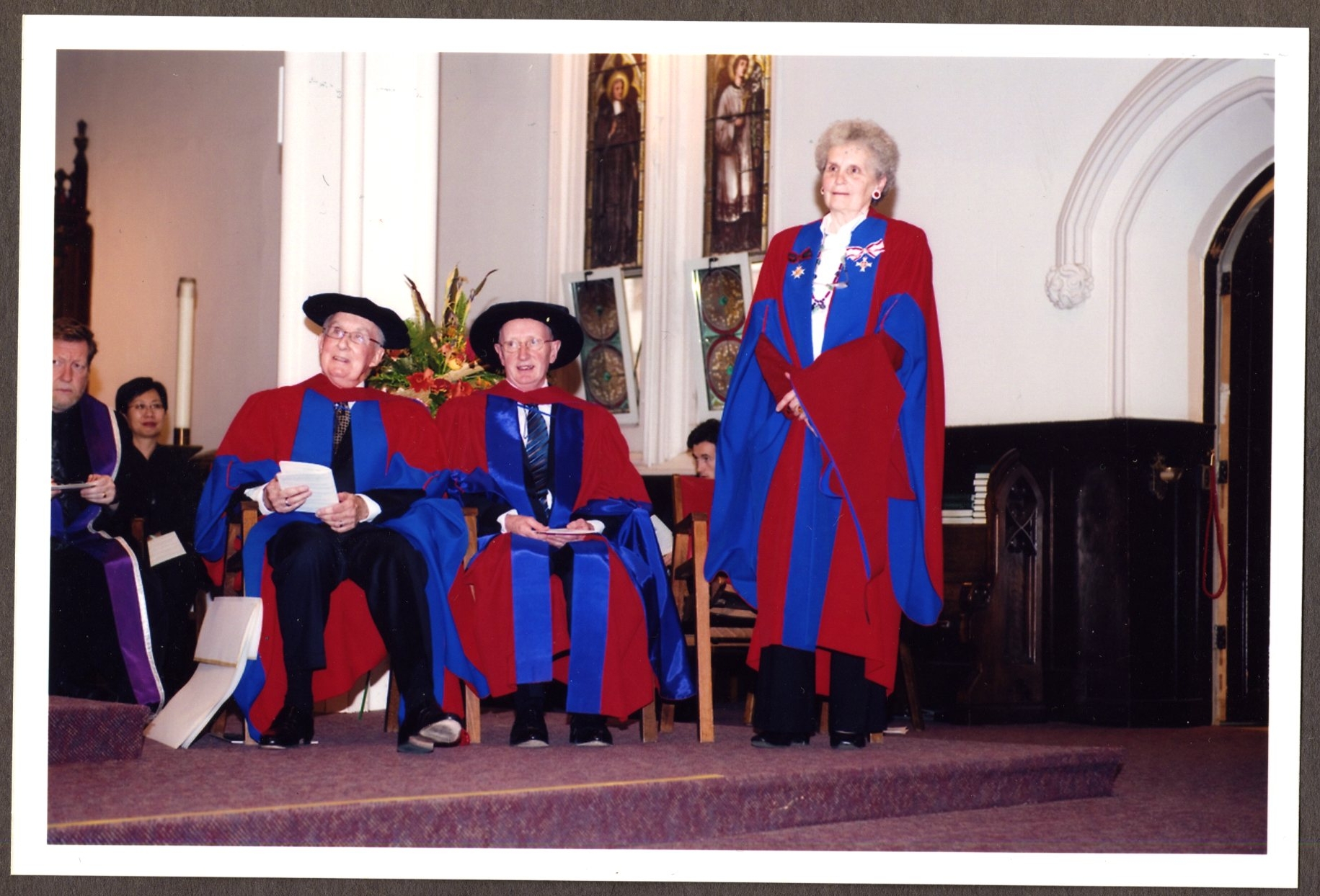 Dr. Janine Langan stands to receive her honorary degree at Fall Convocation 2008 at St. Michael's