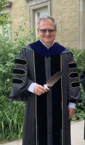 Dr. Mike DeGagne w/Eagle feather