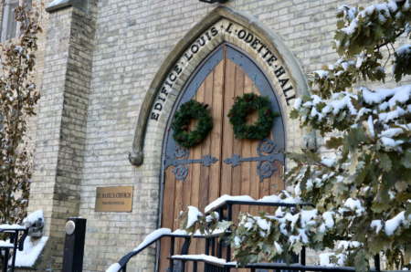 Wreaths hang on the doors of Odette Hall