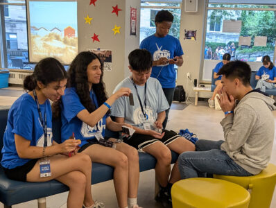 Student leaders and incoming students play card games