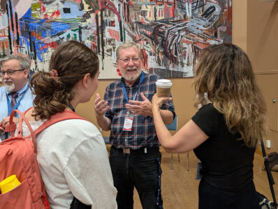 Professor Mark McGowan engages students at Orientation's arts social