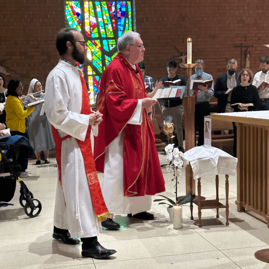 Fr. Gordon Rixon presides over the Memorial Mass at Regis St. Michael's in St. Joseph Chapel on April 24, 2025.