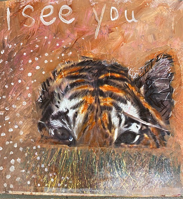 a tiger peeking with the words "i see you"