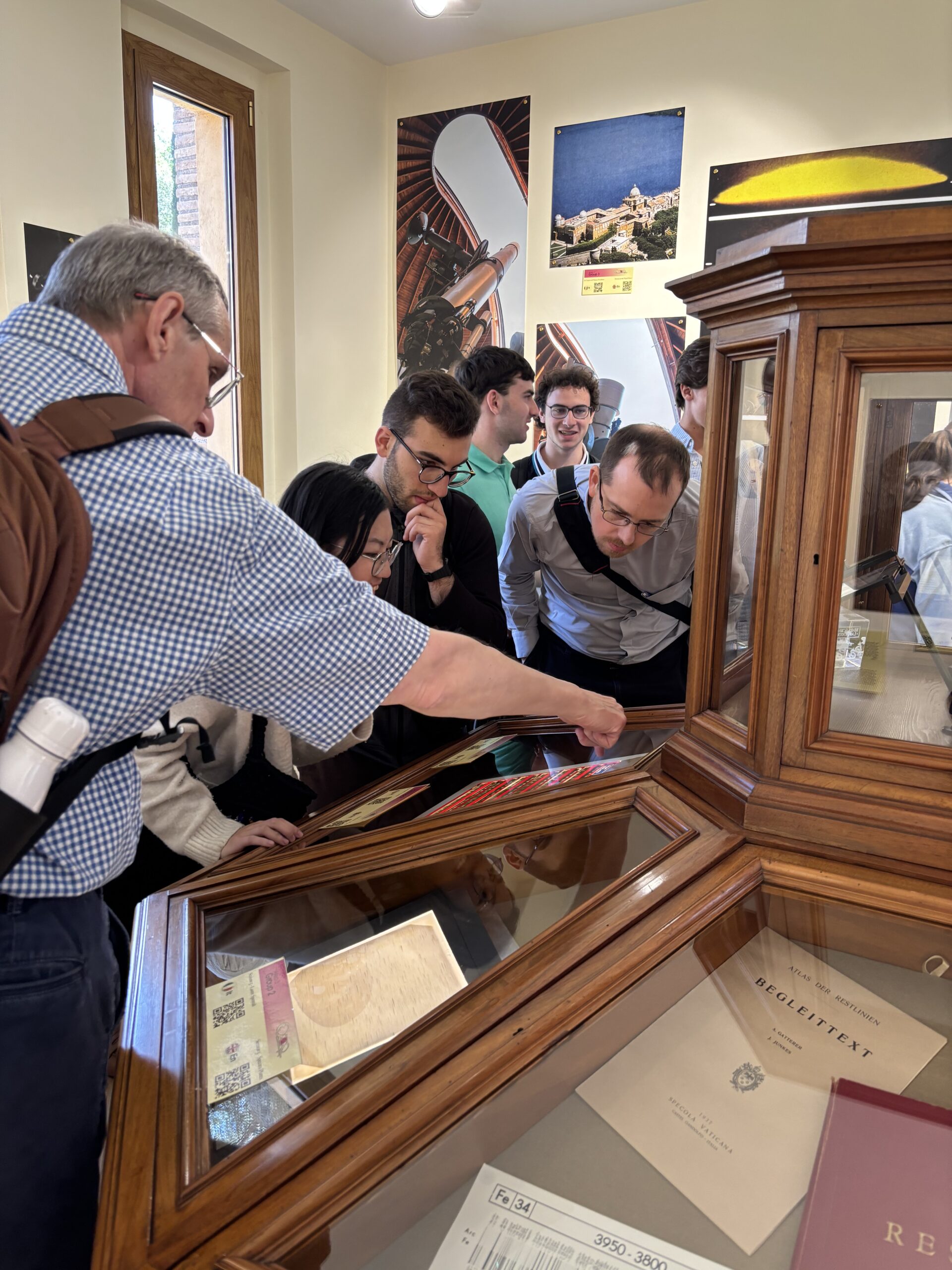Students looking in display case